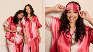 Two models wear recycled Satin striped pyjamas from Their Nibs, eye mask