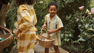 Children wea pyjamas while hunting for easter eggs