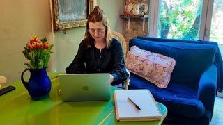 Founder at Fiona sat at a table