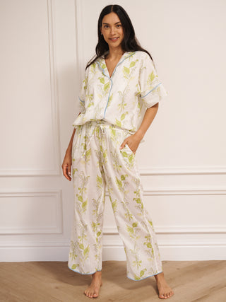 model wears lily of the valley print oversized pyjamas with contrast trim