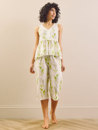 Model wears peplum top floral print capri pyjama set