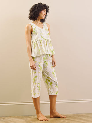 Model wears peplum top floral print capri pyjama set