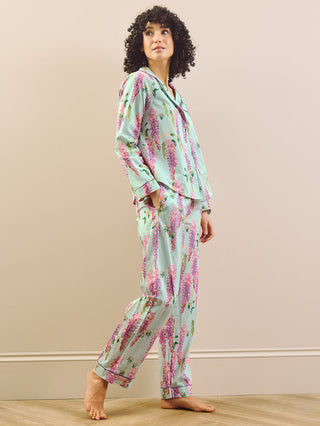 model wears wisteria print short pyjama set. 