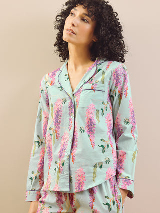 model wears wisteria print short pyjama set. 