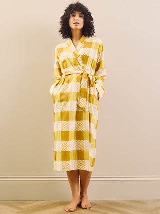 model wears a grandpa robe in large gingham check