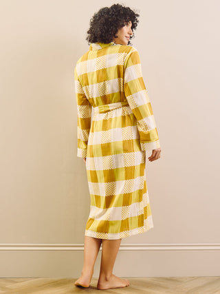 model wears a grandpa robe in large gingham check, back detail