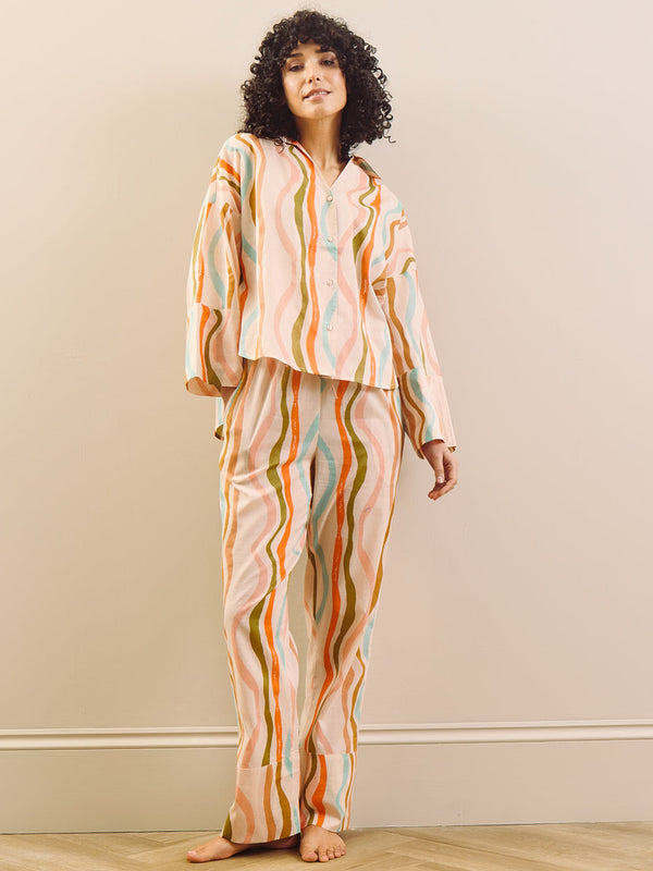 model wears a wavy stripe print pyjama set