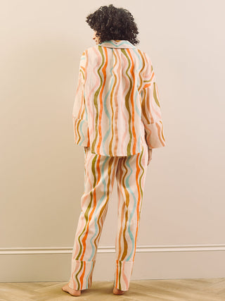 model wears a wavy stripe print pyjama set