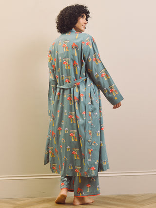 Model wearing a mushroom print dressing gown. 