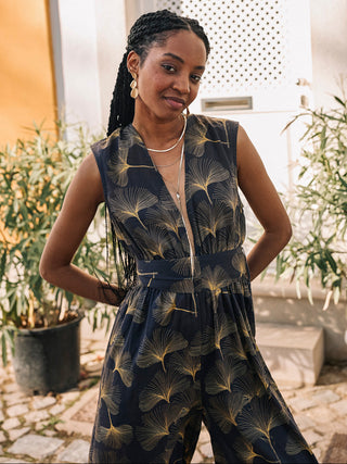 Model wears a black jumpsuit 