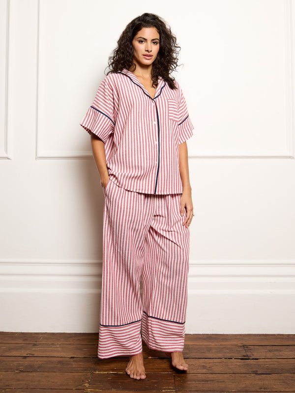 Model wears Candy Stripe pyjama from their nibs