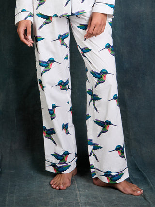 Model wears white humming bird print pyjama bottoms