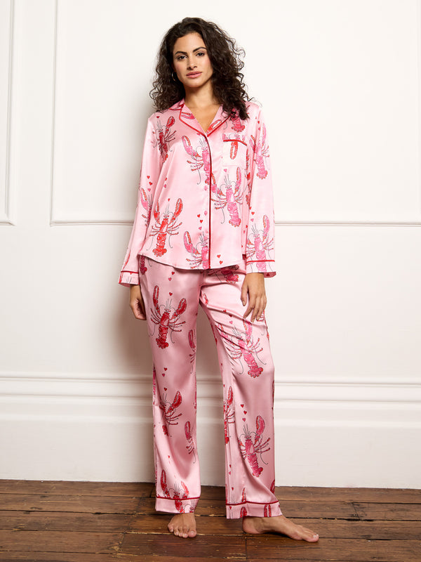 Model wears lobster print long satin pyjamas
