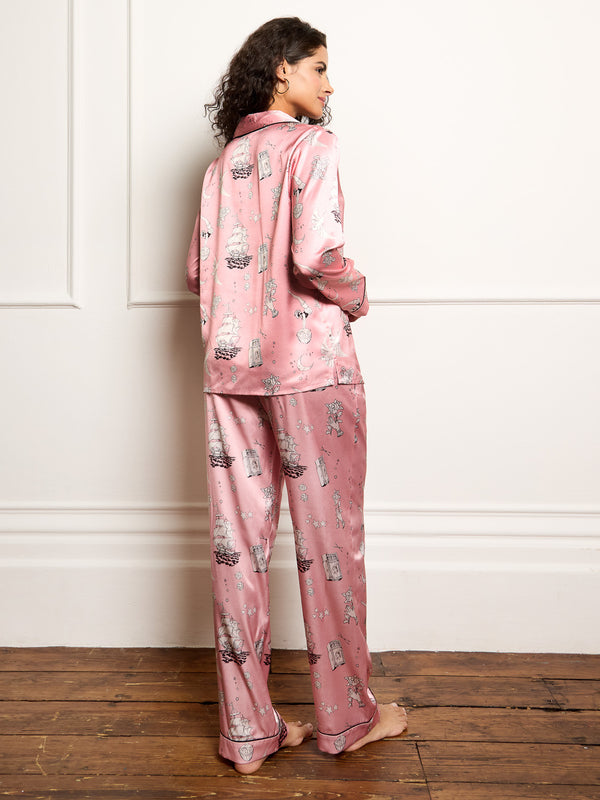 Model wears sailor tattoo inspired print in Their Nibs Long recycled satin pyjamas. Back shot