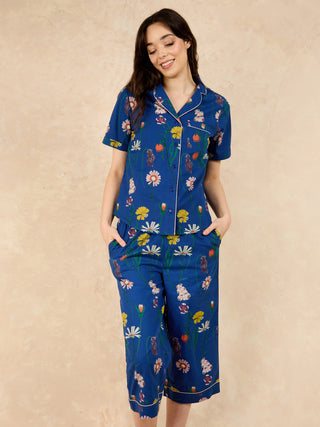 womens floral capri pyjamas , worn by a model agains a neutral background