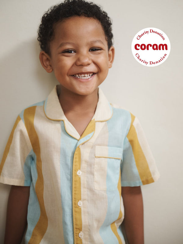 Child Model wears striped pyjamas