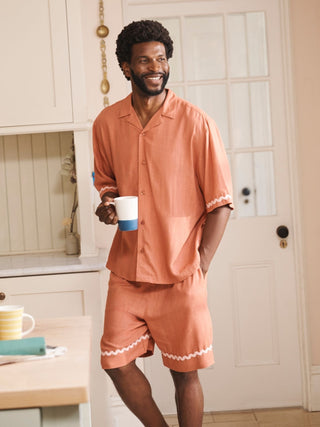 Male model were gingham coord pyjama set