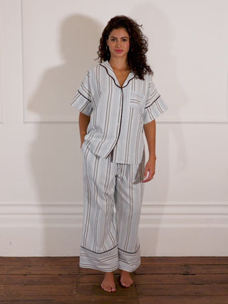 Model in blue pinstripe pyjamas