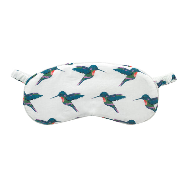 Flat shot of cotton eye mask, white base with watercolour hummingbird pattern