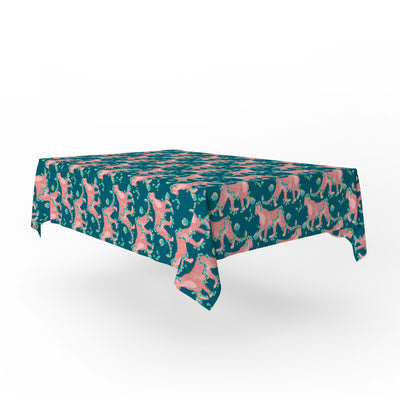 Angled shot of cotton tablecloth shown over table, dark teal base with repeating big cat pattern and carnation floral detailing