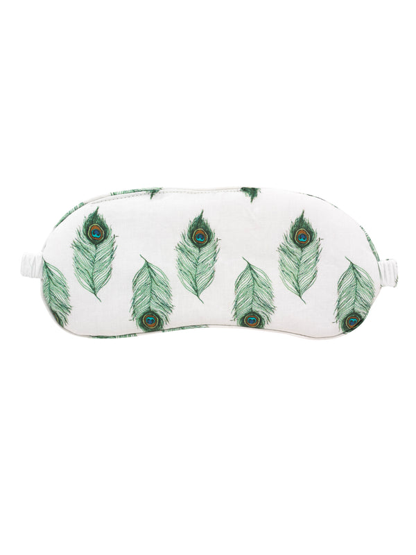 flat shot of cotton eye mask, white base with hand painted peacock pattern